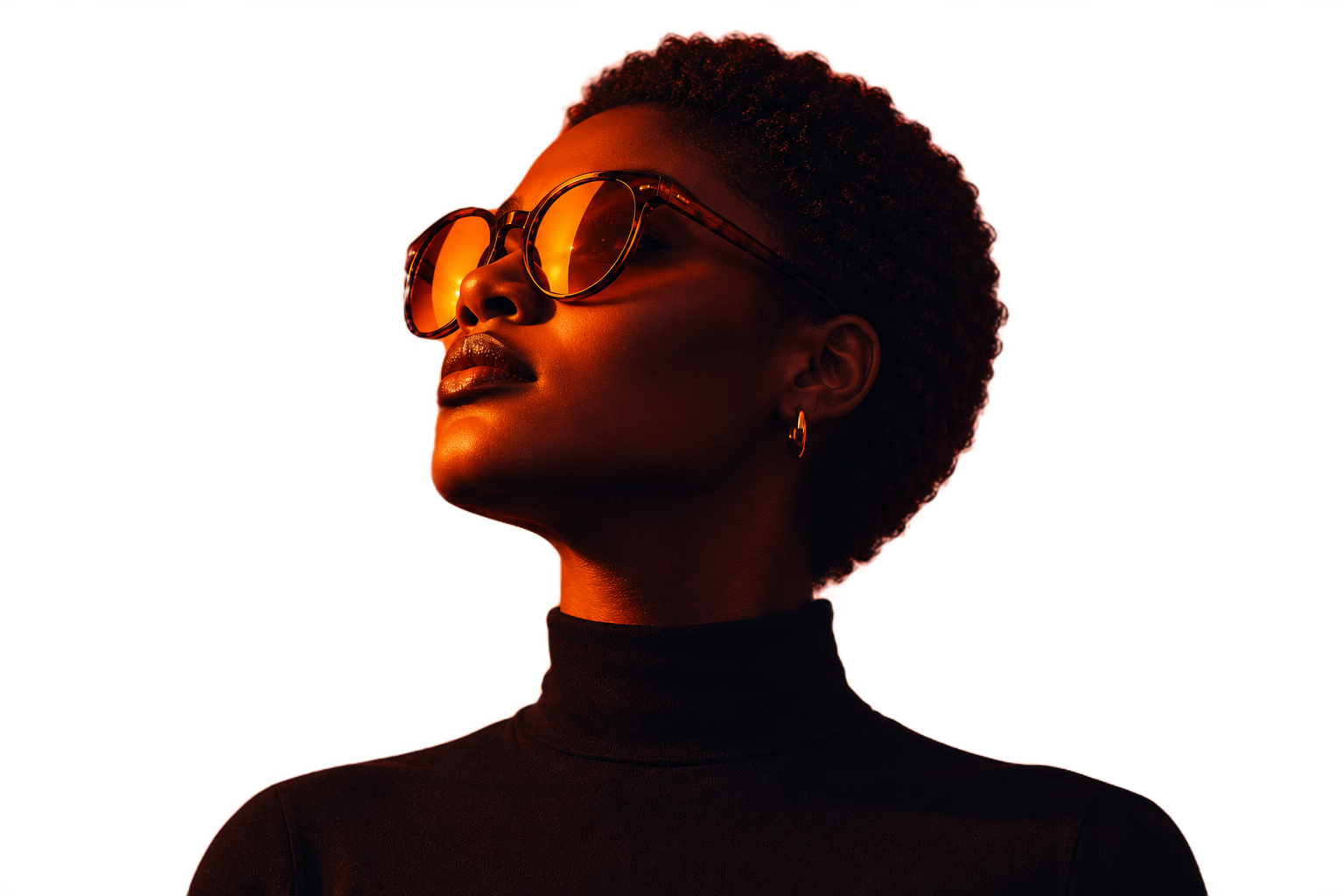 Woman in amber sunglasses and a black turtleneck, lit in orange